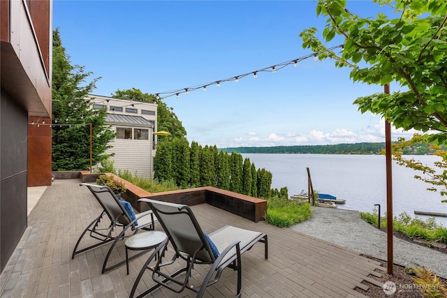 7734 Seward Park Ave S, Seattle, WA 98118 - view of patio / terrace featuring a water view
