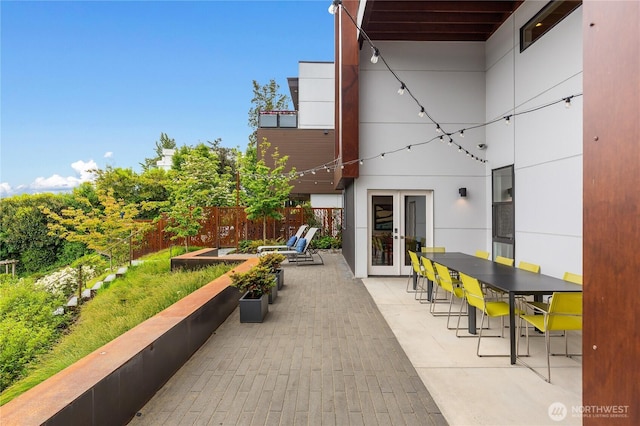 7734 Seward Park Ave S, Seattle, WA 98118 - view of patio featuring french doors and fence