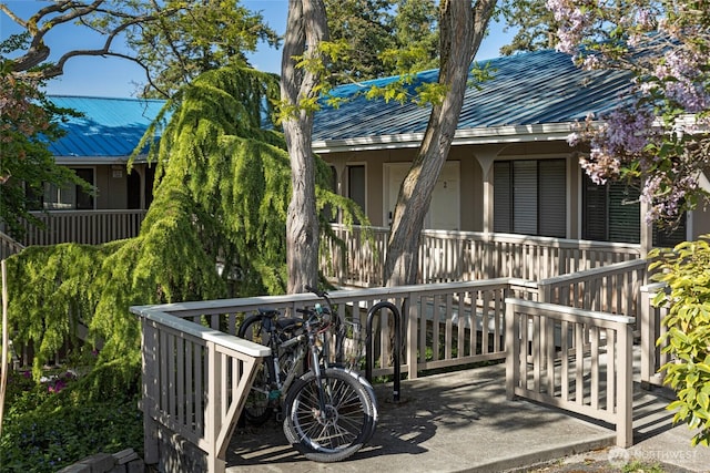 250 Tucker Ave Unit 25, Friday Harbor, WA 98250 - rear view of house with metal roof and covered porch