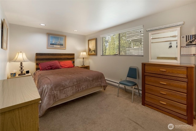 250 Tucker Ave Unit 25, Friday Harbor, WA 98250 - bedroom with carpet flooring, a baseboard heating unit, and recessed lighting