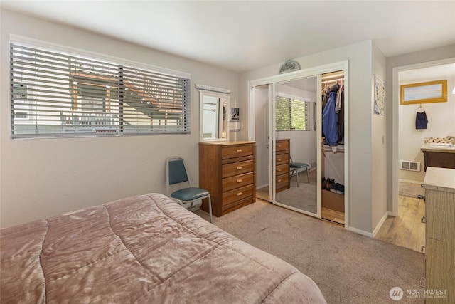250 Tucker Ave Unit 25, Friday Harbor, WA 98250 - bedroom with a closet, light colored carpet, and baseboards