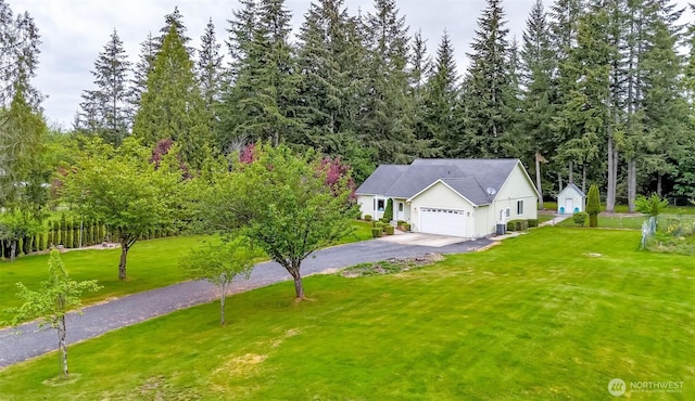 161 Malinka Ln, Chehalis, WA 98532 - view of front of house with a front lawn, asphalt driveway, a garage, and a shed