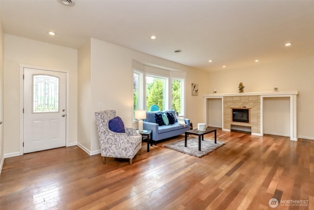 161 Malinka Ln, Chehalis, WA 98532 - living area featuring hardwood / wood-style floors, a tile fireplace, baseboards, and recessed lighting