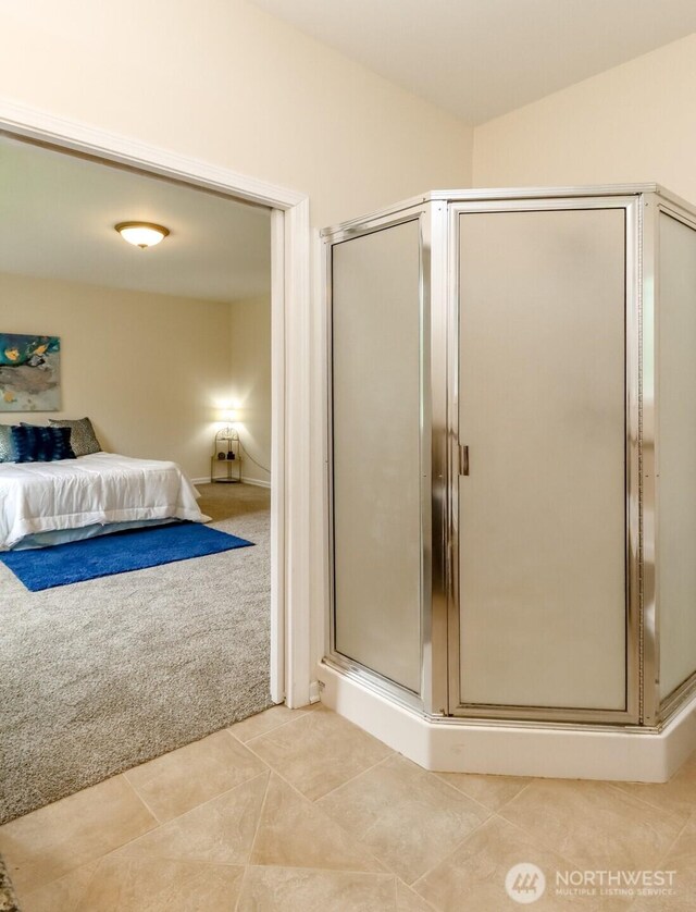 161 Malinka Ln, Chehalis, WA 98532 - bathroom with ensuite bath, a stall shower, and tile patterned flooring