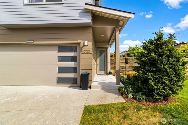 4720 Spring Vista Way, Bellingham, WA 98226 - property entrance featuring fence, a garage, and driveway