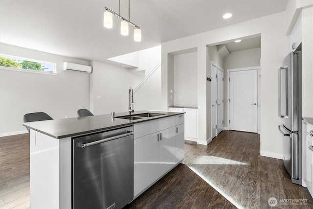 4720 Spring Vista Way, Bellingham, WA 98226 - kitchen with a sink, stainless steel appliances, a wall mounted AC, white cabinetry, and dark wood-type flooring
