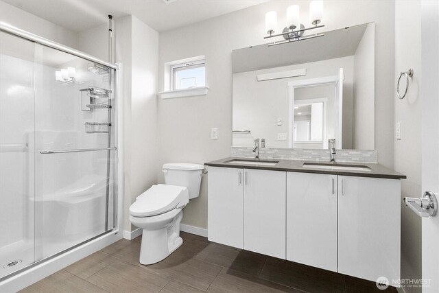 4720 Spring Vista Way, Bellingham, WA 98226 - full bath with toilet, a stall shower, double vanity, and baseboards