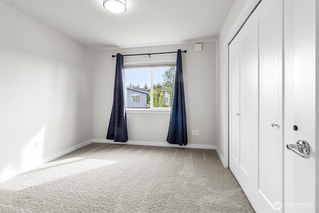 4720 Spring Vista Way, Bellingham, WA 98226 - unfurnished bedroom featuring a closet, carpet flooring, and baseboards