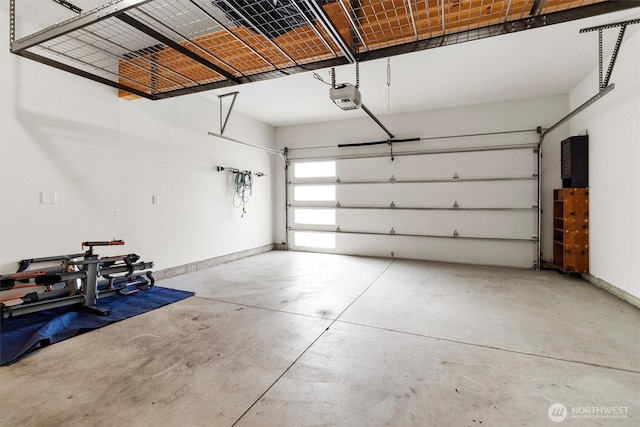 4720 Spring Vista Way, Bellingham, WA 98226 - garage featuring a garage door opener and baseboards