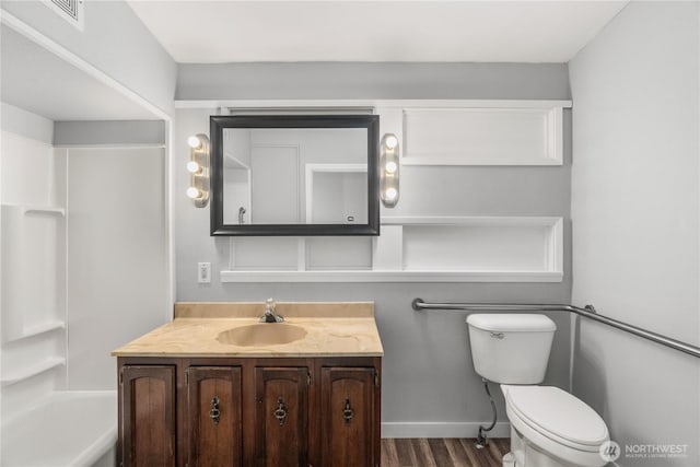 2404 Sumner Ave, Aberdeen, WA 98520 - full bath with wood finished floors, vanity, and toilet