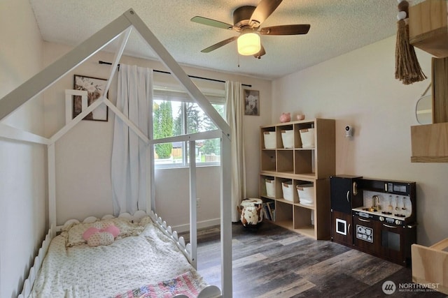19411 67th St E, Bonney Lake, WA 98391 - bedroom featuring wood finished floors, a textured ceiling, and ceiling fan