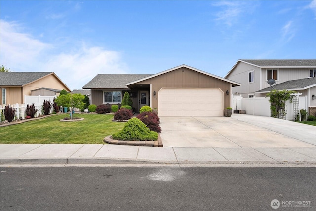 985 S 10th Ave, Othello, WA 99344 - view of front of home featuring a garage and driveway