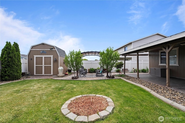 985 S 10th Ave, Othello, WA 99344 - view of yard featuring a storage shed, a patio, and an outdoor structure