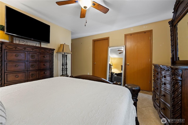 985 S 10th Ave, Othello, WA 99344 - bedroom featuring light tile patterned flooring and a ceiling fan
