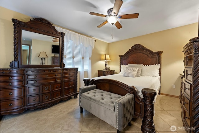 985 S 10th Ave, Othello, WA 99344 - bedroom featuring light tile patterned floors, ceiling fan, and baseboards