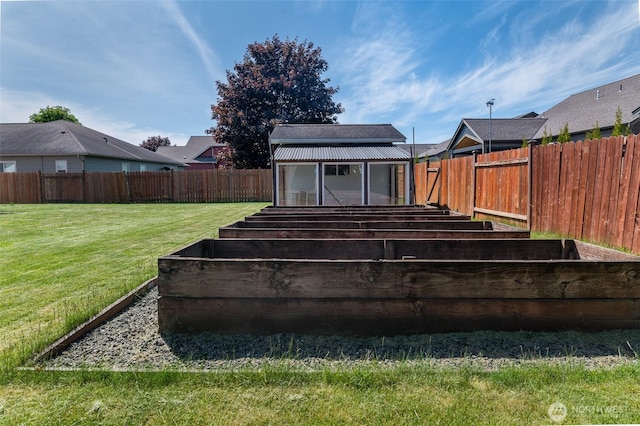 1392 Myers Dr, Ferndale, WA 98248 - view of yard with a vegetable garden and an outbuilding