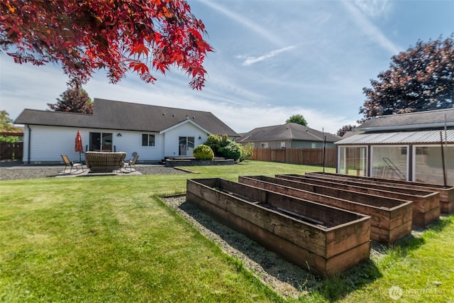 1392 Myers Dr, Ferndale, WA 98248 - rear view of house featuring a garden, a patio area, and a greenhouse
