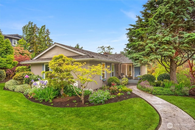 7915 SE 34th St, Mercer Island, WA 98040 - view of front facade featuring a front yard and a chimney