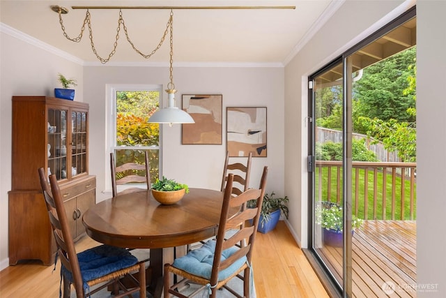 7915 SE 34th St, Mercer Island, WA 98040 - dining room with light wood-type flooring, crown molding, and baseboards