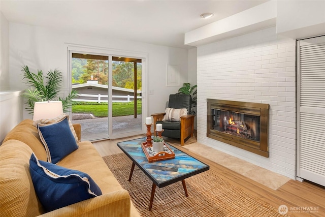 7915 SE 34th St, Mercer Island, WA 98040 - living area with wood finished floors and a glass covered fireplace