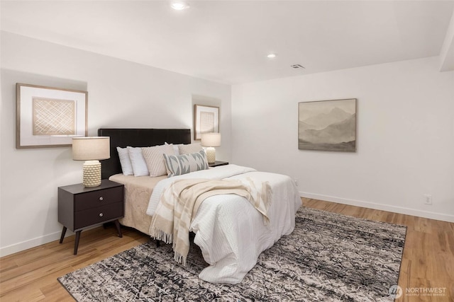 7915 SE 34th St, Mercer Island, WA 98040 - bedroom featuring wood finished floors, baseboards, and recessed lighting