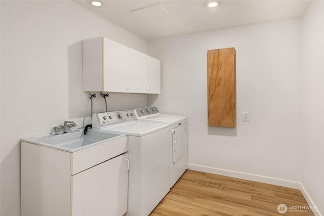 7915 SE 34th St, Mercer Island, WA 98040 - laundry area with cabinet space, washer and dryer, light wood-style floors, baseboards, and recessed lighting