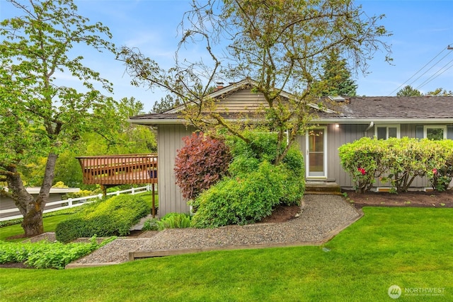 7915 SE 34th St, Mercer Island, WA 98040 - view of front of home featuring a front lawn, a wooden deck, and board and batten siding