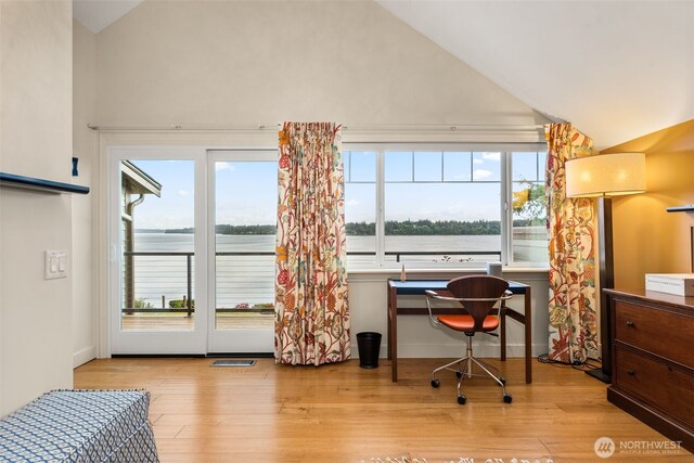 7342 Huckleberry Rd NW, Olympia, WA 98502 - office featuring vaulted ceiling, wood finished floors, and a water view