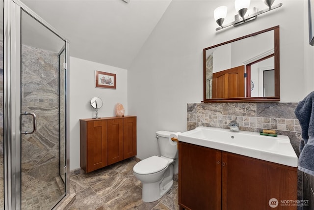 7342 Huckleberry Rd NW, Olympia, WA 98502 - full bathroom with lofted ceiling, vanity, a stall shower, and toilet