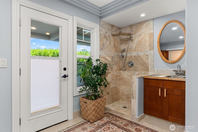 7342 Huckleberry Rd NW, Olympia, WA 98502 - full bath with a tile shower, vanity, recessed lighting, and ornamental molding