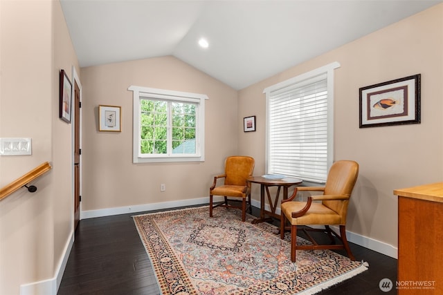 7342 Huckleberry Rd NW, Olympia, WA 98502 - living area with dark wood-style floors, baseboards, and lofted ceiling