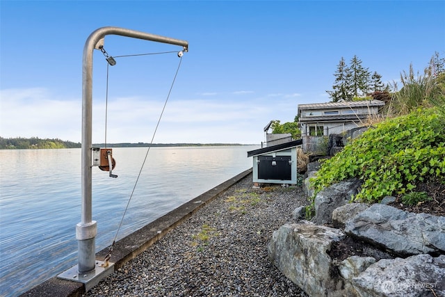 7342 Huckleberry Rd NW, Olympia, WA 98502 - dock featuring a water view