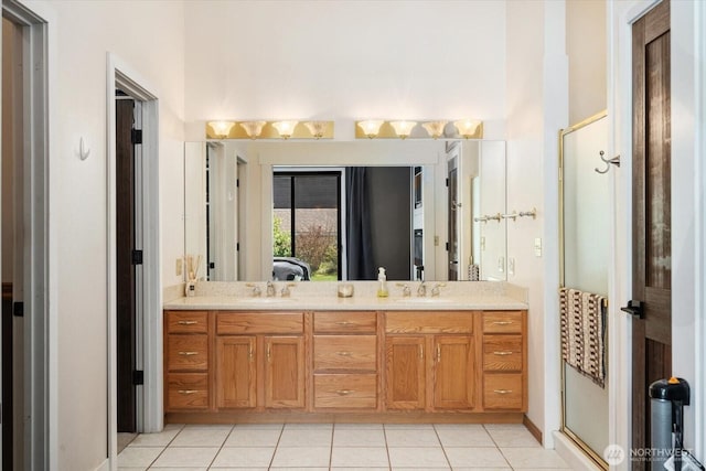 381 Pebble Beach Dr, Cle Elum, WA 98922 - bathroom featuring a stall shower, double vanity, and tile patterned floors