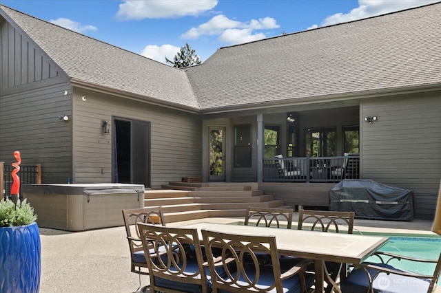 381 Pebble Beach Dr, Cle Elum, WA 98922 - view of patio with a hot tub and outdoor dining area