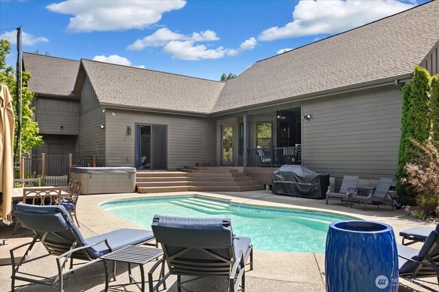 381 Pebble Beach Dr, Cle Elum, WA 98922 - view of pool featuring a hot tub, a patio area, and area for grilling