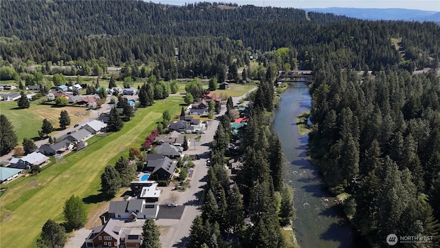 381 Pebble Beach Dr, Cle Elum, WA 98922 - aerial overview of property's location featuring a heavily wooded area, a large body of water, and nearby suburban area