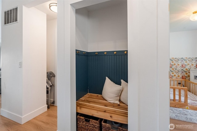 2707 Angel Ln, East Wenatchee, WA 98802 - mudroom featuring wood finished floors, baseboards, and wainscoting