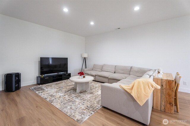 2707 Angel Ln, East Wenatchee, WA 98802 - living room with light wood-style floors, recessed lighting, and baseboards