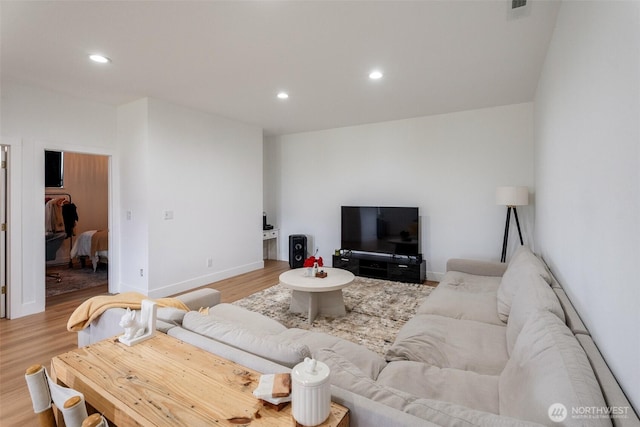 2707 Angel Ln, East Wenatchee, WA 98802 - living room featuring recessed lighting, light wood finished floors, and baseboards