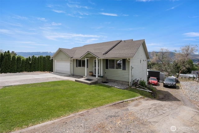2707 Angel Ln, East Wenatchee, WA 98802 - ranch-style home with concrete driveway, an attached garage, a front yard, and roof with shingles