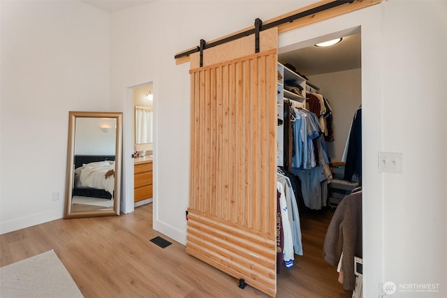 2707 Angel Ln, East Wenatchee, WA 98802 - spacious closet featuring wood finished floors and a barn door