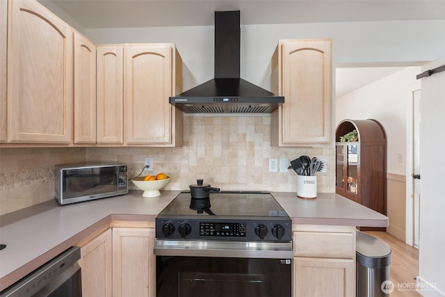 2707 Angel Ln, East Wenatchee, WA 98802 - kitchen featuring light brown cabinets, appliances with stainless steel finishes, and wall chimney range hood