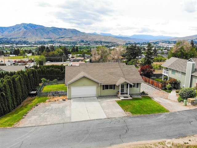 2707 Angel Ln, East Wenatchee, WA 98802 - view of front of home with a garage, driveway, and a mountain view