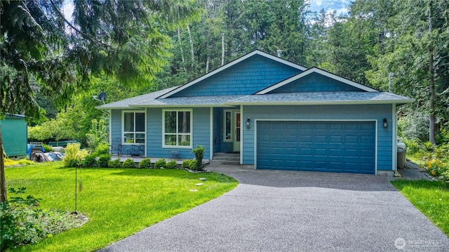 157 Northwood Dr, Point Roberts, WA 98281 - single story home featuring a front lawn, driveway, a garage, and roof with shingles