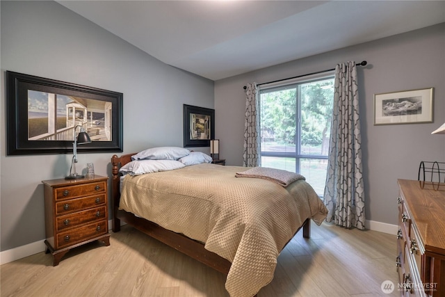 157 Northwood Dr, Point Roberts, WA 98281 - bedroom featuring light wood-style floors, baseboards, and vaulted ceiling