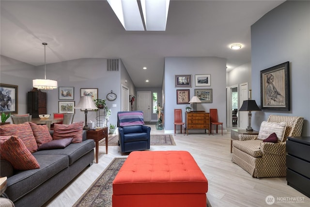 157 Northwood Dr, Point Roberts, WA 98281 - living area with healthy amount of natural light, light wood-style floors, vaulted ceiling, recessed lighting, and a skylight