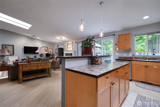 157 Northwood Dr, Point Roberts, WA 98281 - kitchen featuring a sink, lofted ceiling, dark countertops, plenty of natural light, and open floor plan