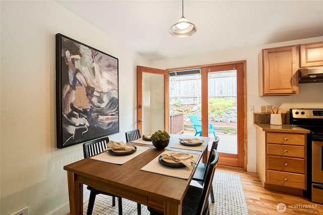 9514 Sand Point Way NE, Seattle, WA 98115 - dining room featuring light wood-type flooring and baseboards