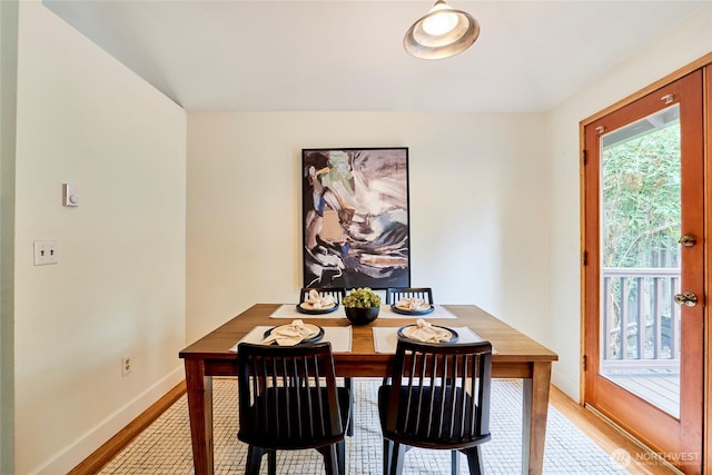 9514 Sand Point Way NE, Seattle, WA 98115 - dining space with light wood-style floors and baseboards