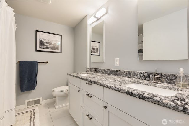 229 S 171st St, Burien, WA 98148 - full bathroom featuring toilet, baseboards, tile patterned flooring, and double vanity